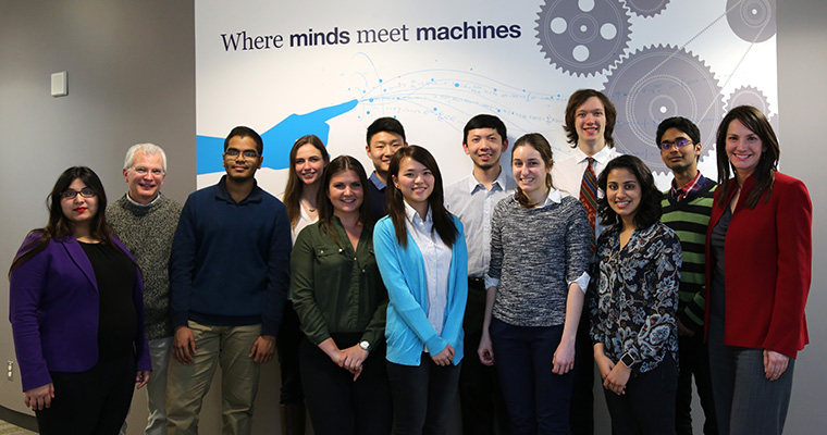 Alumna Marisa Sterling (far right), faculty and members of the Ontario Professional Engineers Foundation for Education pose with undergraduate scholarship recipients in the Bahen Centre for Information Technology. (Photo: Jamie Hunter)