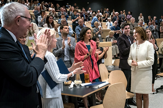 Dean Cristina Amon (right) receives a standing ovation after her speech at the Celebration of Leadership event on Wednesday, June 26, 2019. (credit: Lisa Sakulensky)