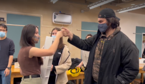 Students high-five.