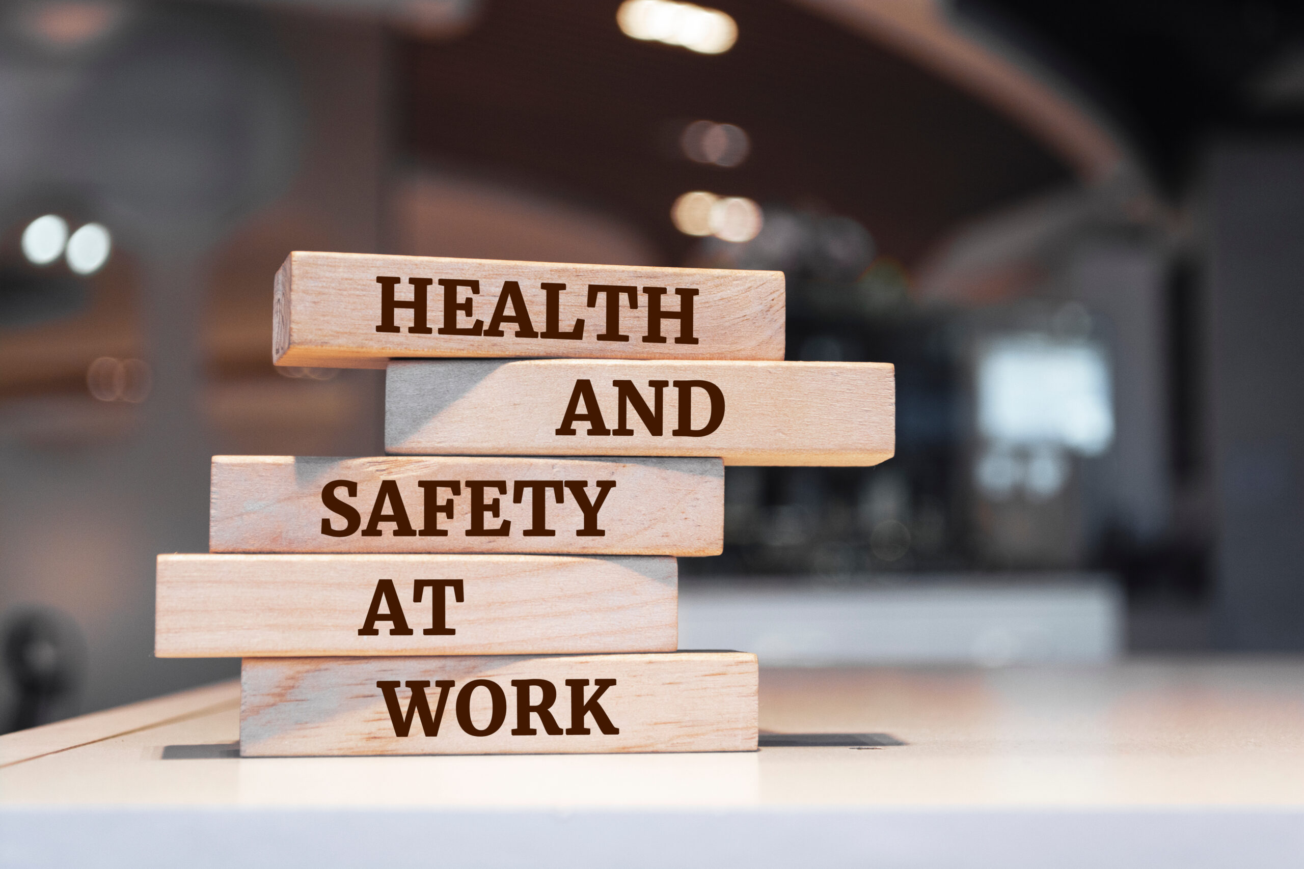 Wooden blocks with words 'Health and Safety at work'.