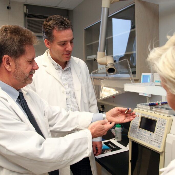 Professor Robert C Andrews (left) with Profs. Ron Hofmann and Susan Andrews in the Drinking Water Environmental Labs