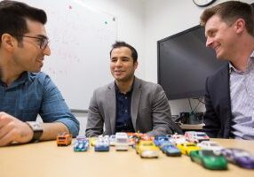 Left to right: Sina Bahrami (CivE PhD candidate), Mehdi Nourinejad (CivE PhD 1T7) and Professor Matthew Roorda (CivE) designed an algorithm to optimize the design of parking lots for autonomous vehicles, increasing their capacity by an average of 62 per cent. (Photo: Roberta Baker)
