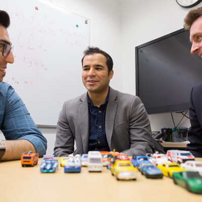 Left to right: Sina Bahrami (CivE PhD candidate), Mehdi Nourinejad (CivE PhD 1T7) and Professor Matthew Roorda (CivE) designed an algorithm to optimize the design of parking lots for autonomous vehicles, increasing their capacity by an average of 62 per cent. (Photo: Roberta Baker)