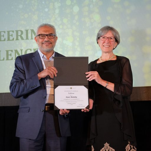 Professor Amer Shalaby accepts award from Dr. Brenda McCabe, President, CSCE, at the CSCE 2022 Annual Conference, Whistler, B.C., May 27, 2022.