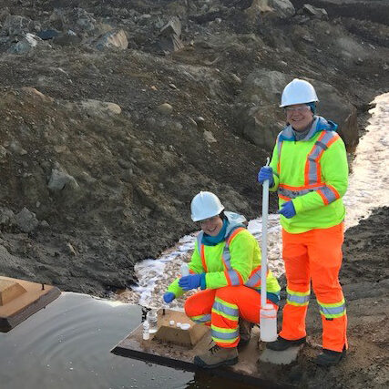 University of Toronto researchers Tara Colenbrander Nelson and Dr. Kelly Whaley Martin collecting water samples at Hudbay’s 777 mine in Flin Flon, Manitoba for use in their innovative “reactive sulfur” monitoring technique. (Photo: Prof. Lesley Warren)