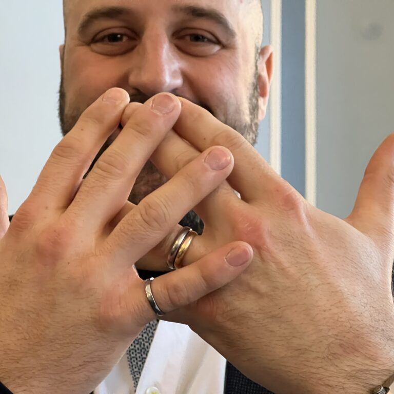 Daniel Alonzi displays his Iron Ring  and wedding ring. (Photo by Phill Snel)