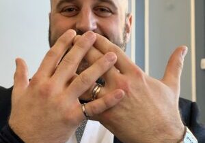 Daniel Alonzi displays his Iron Ring  and wedding ring. (Photo by Phill Snel)