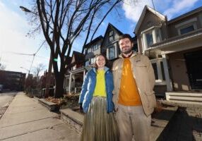 DECEMBER 12, 2024 — LOOKING INSIDE STRUCTURES — Professor Shoshanna Saxe of Department of Civil &amp; Mineral Engineering (CivMin) at the University of Toronto and Alex Olson, a senior AI researcher at the Centre for Analytics and Artificial Intelligence Engineering (CARTE) pose for a photo: (1) on a downtown Toronto residential street and (2) in an office with Streetview images. They are part of a team that has used machine learning (AI) to recognize various characteristics of structures. (Photo by Phill Snel / CivMin, University of Toronto)