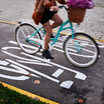 Toronto aims to have 75% of school/work trips under 5 kilometres walked, biked or by transit by 2030. Protected bike lanes have been shown to increase cycling. The question is: where should they go and how should we decide? (photo by anatoliy_gleb, via Envato Elements)